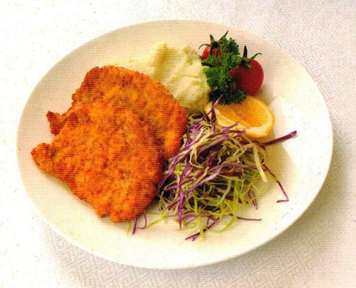 Pan-Seared Pork Chop with Mashed Potatoes and Vegetable Salad